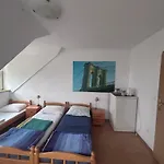 Penzion Pod Kogutami *